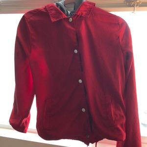 red windbreaker